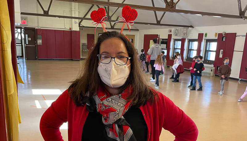 Ms. Arlene dressed up for the Valentin's day.