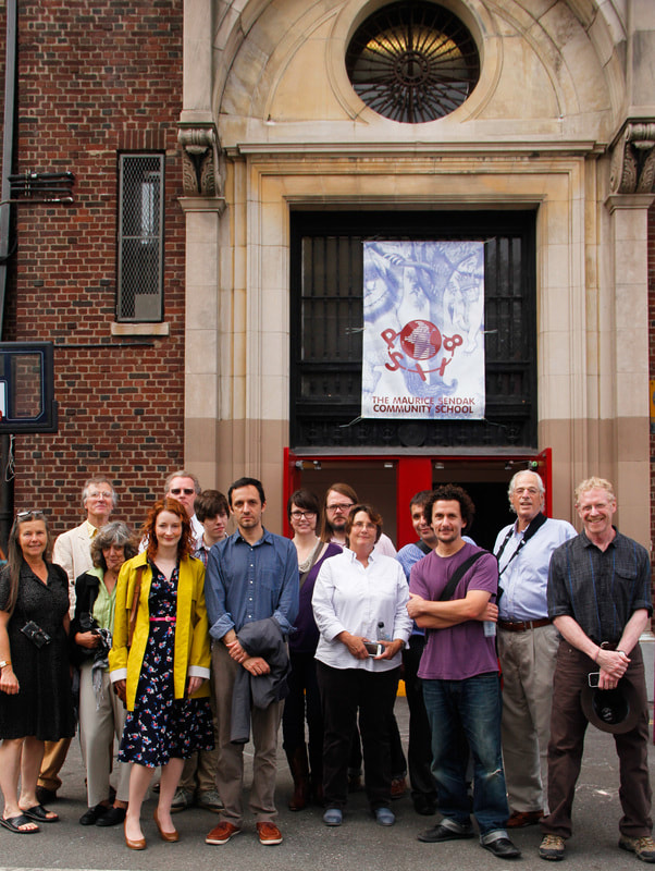Group portrait in front of the PS118 building.